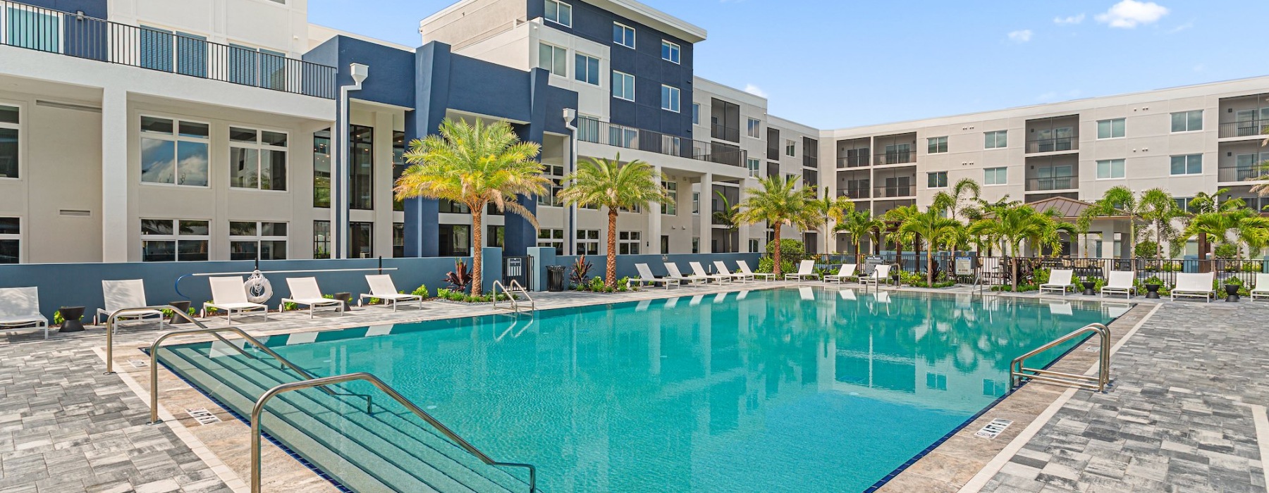 pool with lounge chairs