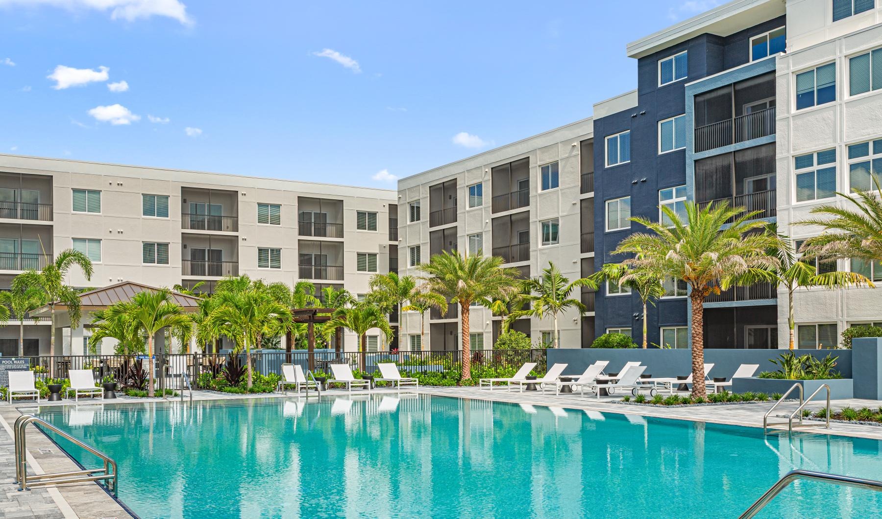 a pool in front of a building