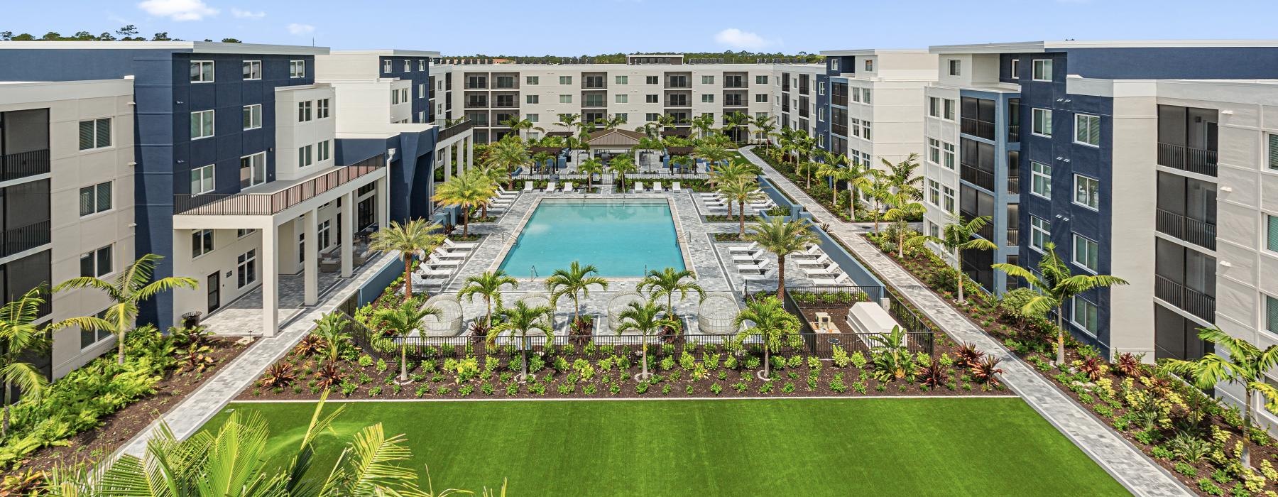 a pool in a courtyard of a building